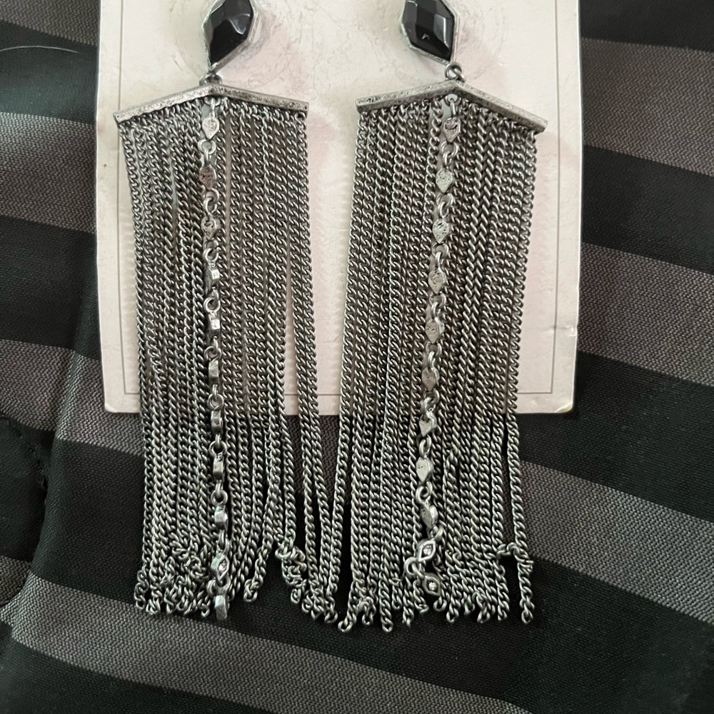 Brand new never worn long dangle with black jewel at top
